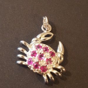 Ruby crab charm.